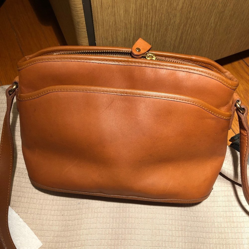 Medallion leather shoulder adjustable bag